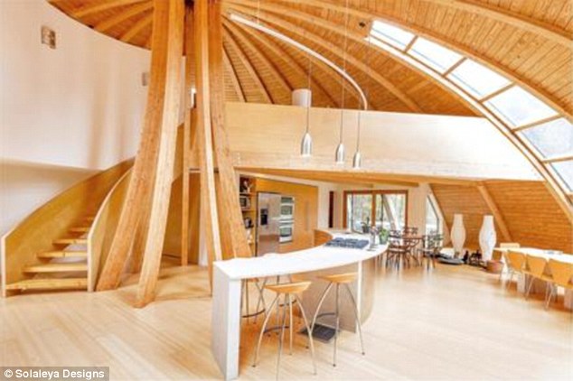 2A2DAF5200000578-3147562-Wow_factor_With_soaring_ceilings_and_curved_windows_the_wooden_s-a-5_1435917420024